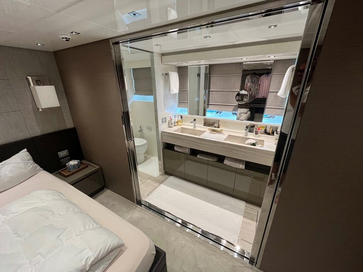 a bathroom with a large mirror aboard 2021 SANLORENZO SL78 #721 Yacht for Sale