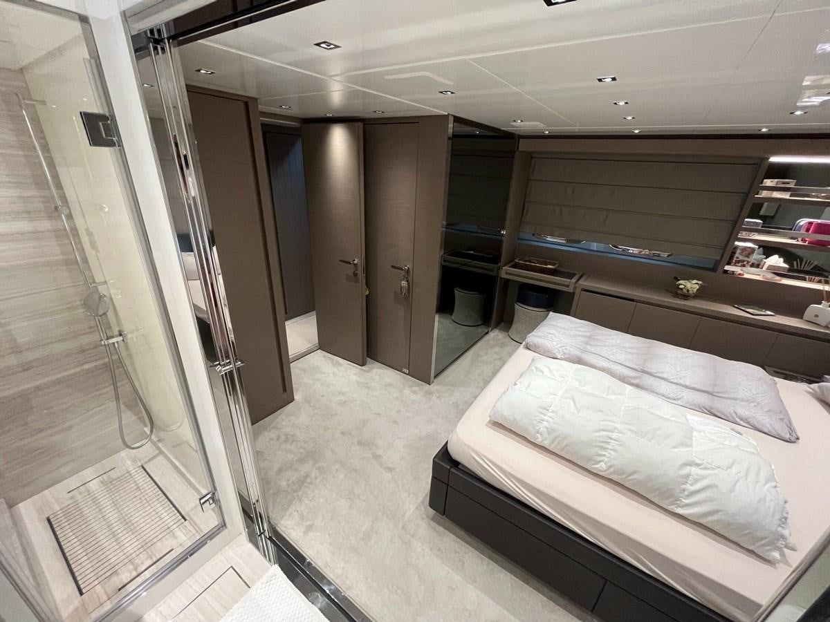 a room with a bed and a door aboard 2021 SANLORENZO SL78 #721 Yacht for Sale