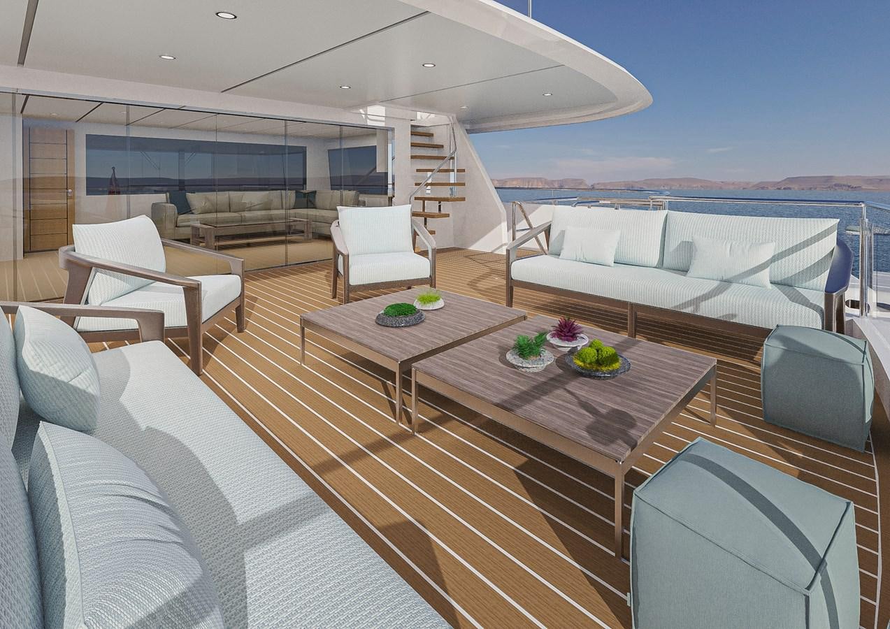 a living room with a large balcony aboard DELETE Yacht for Sale