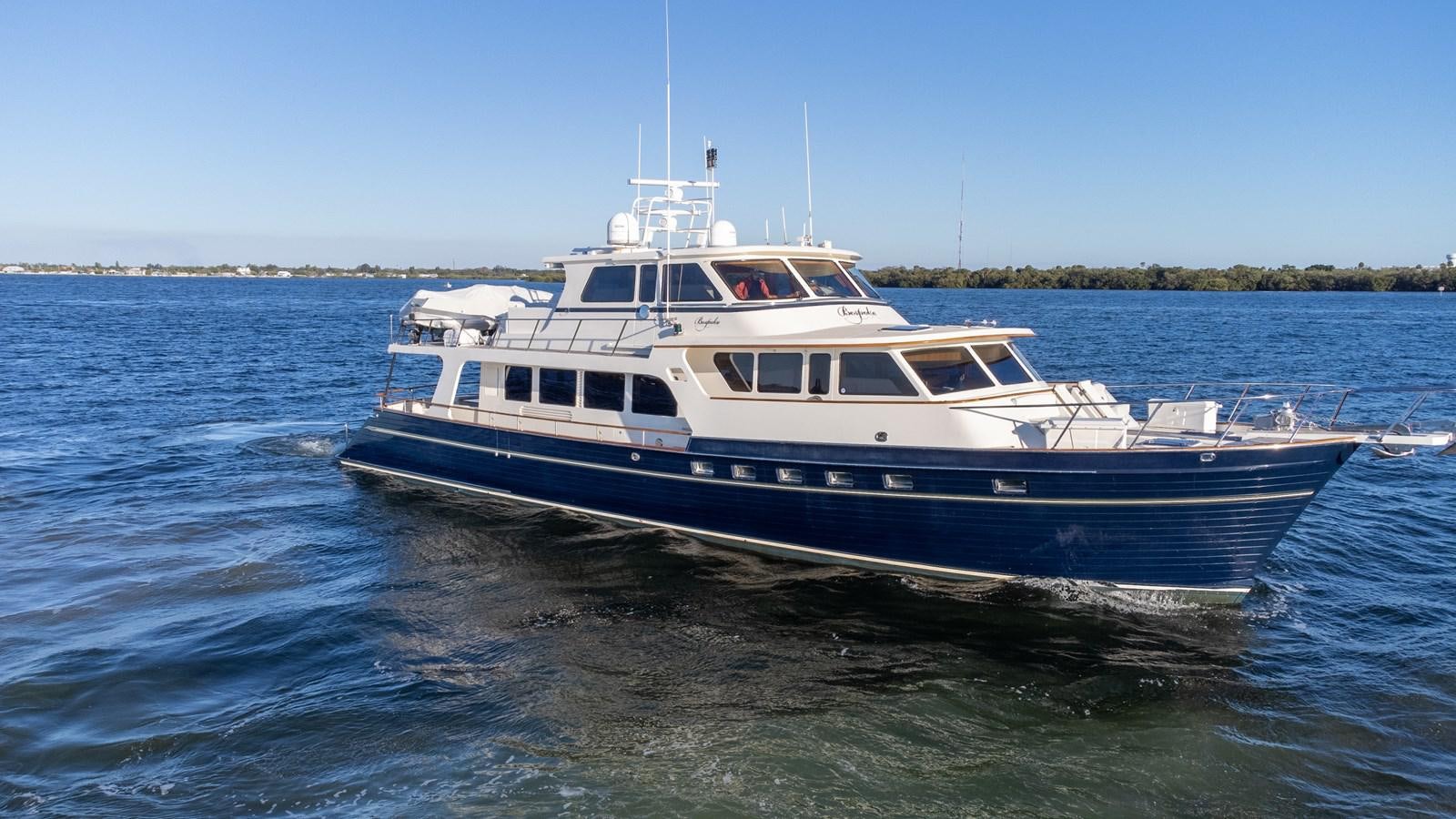 a boat on the water aboard BESPOKE Yacht for Sale