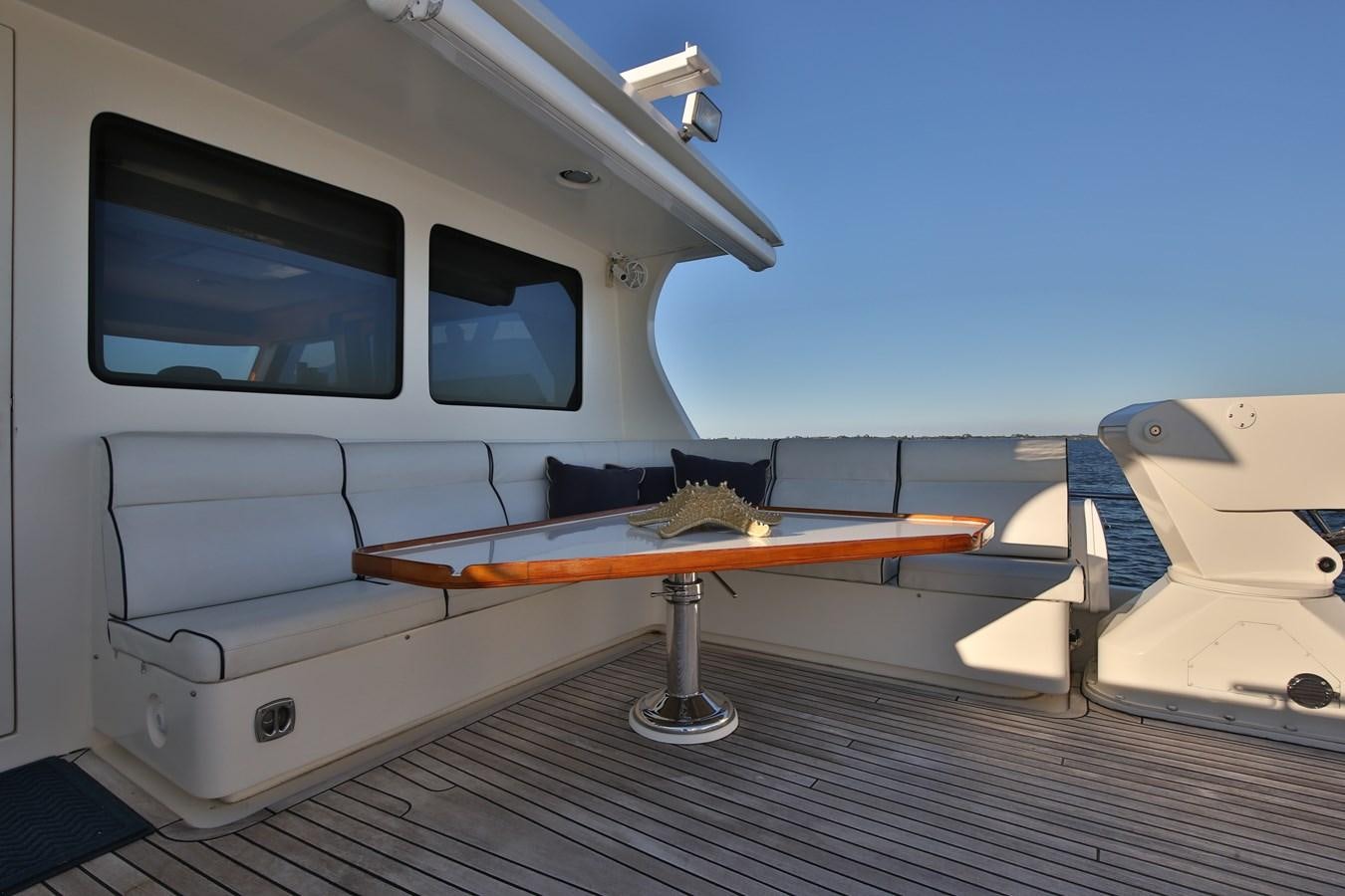 a boat on a deck aboard BESPOKE Yacht for Sale