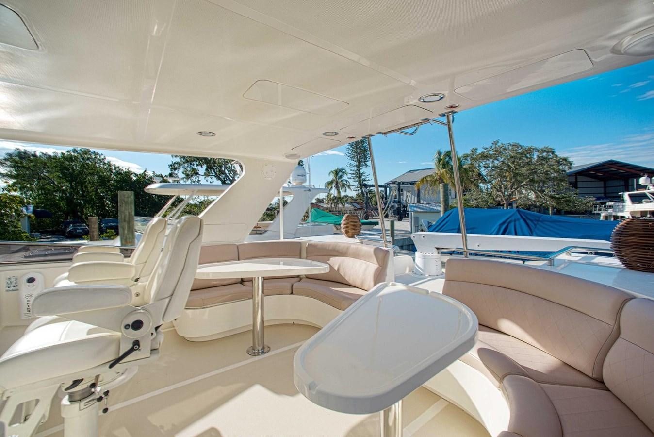 a room with a pool and lounge chairs aboard DISCONNECTED Yacht for Sale