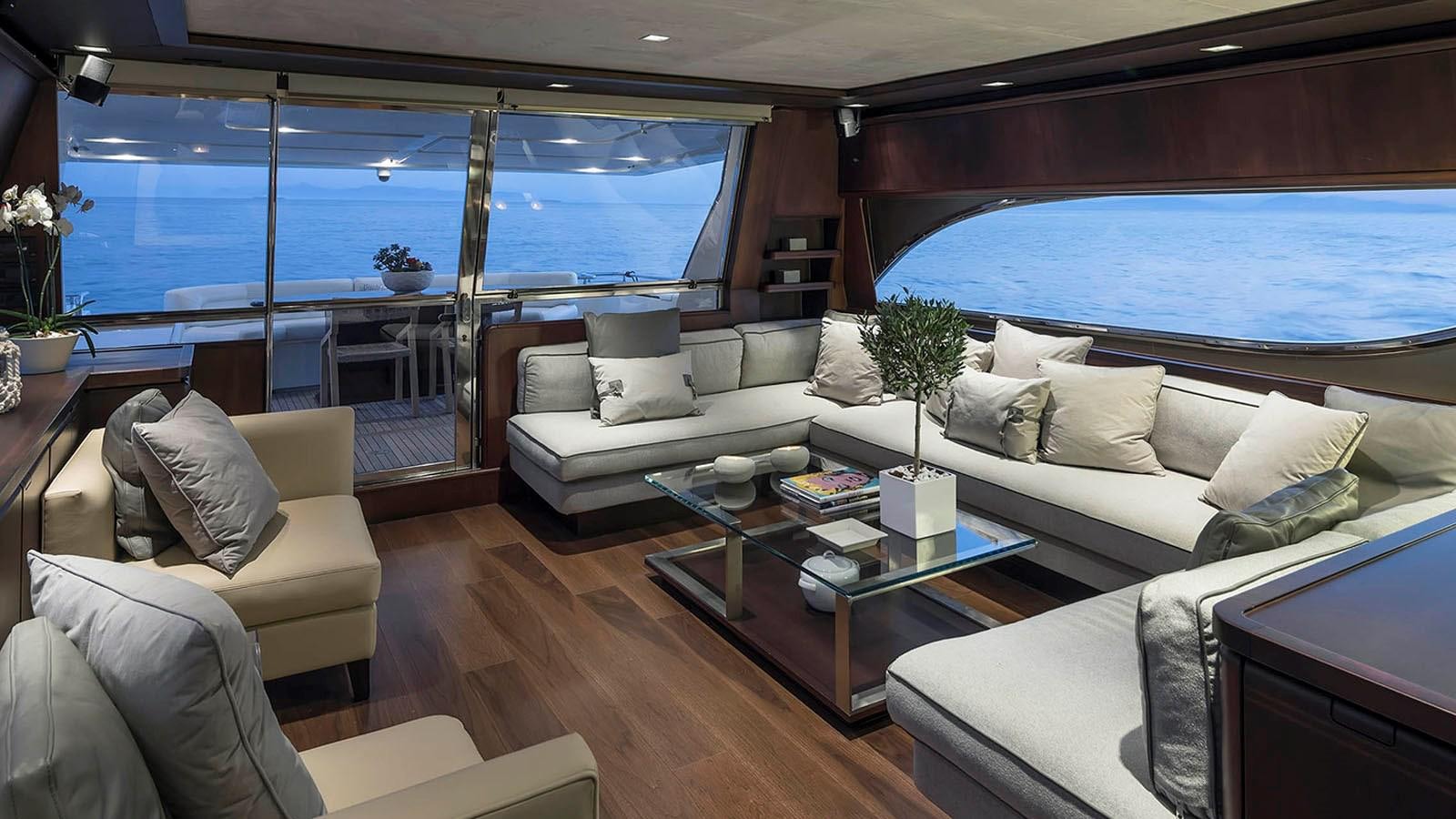 a living room with a large window aboard LAZY DAYS Yacht for Sale