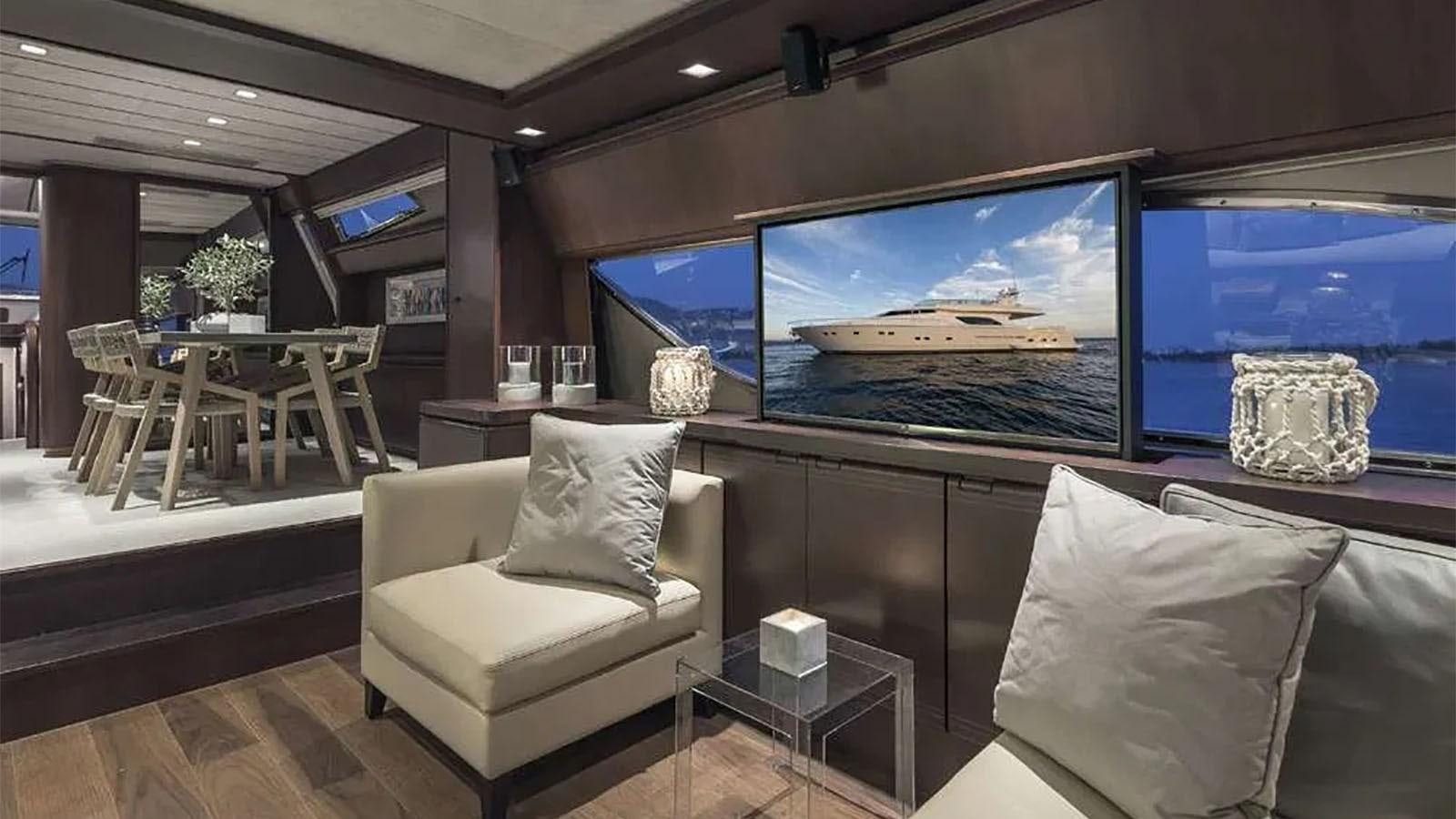a room with a couch and a tv aboard LAZY DAYS Yacht for Sale