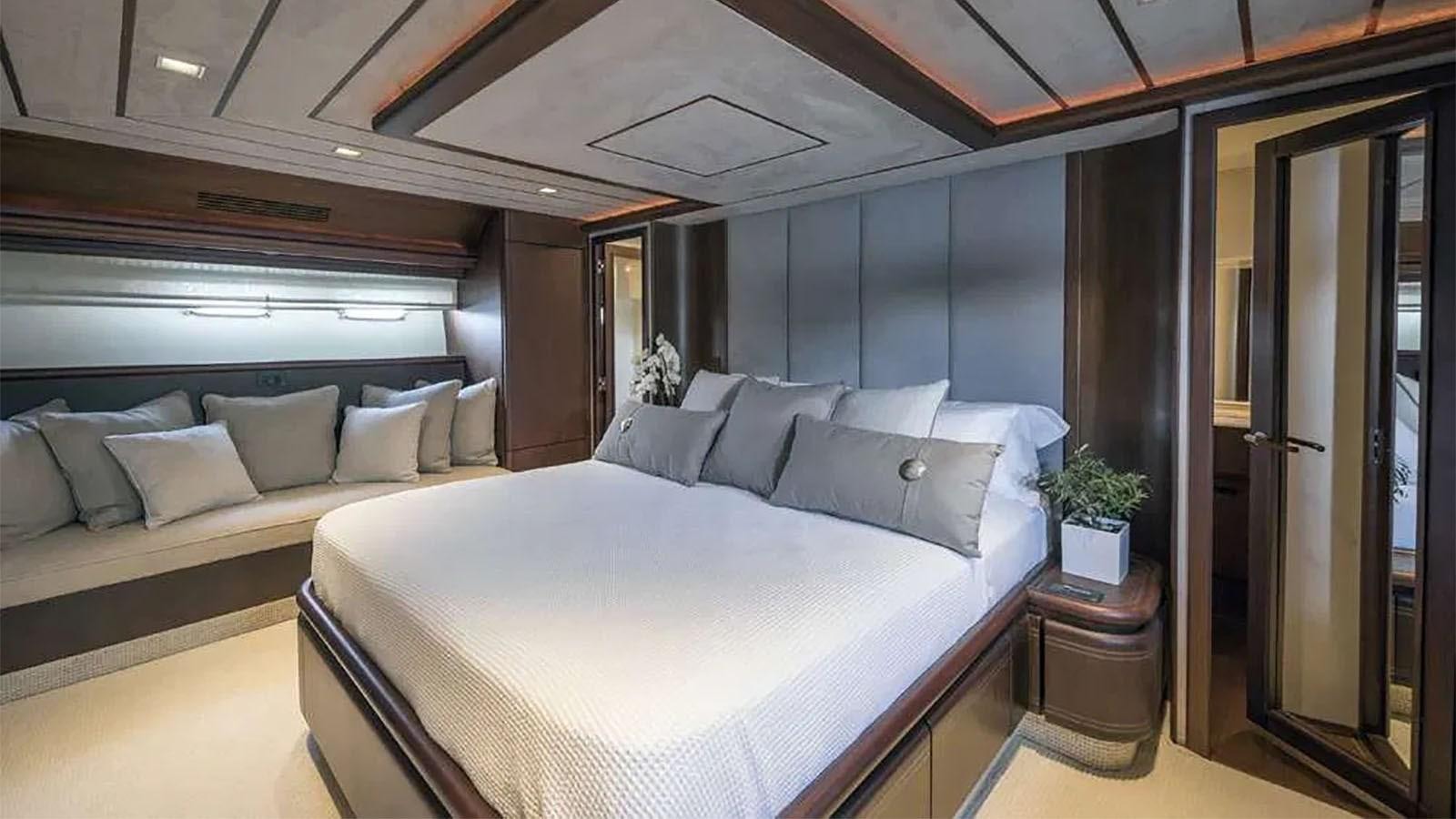 a bed in a room aboard LAZY DAYS Yacht for Sale
