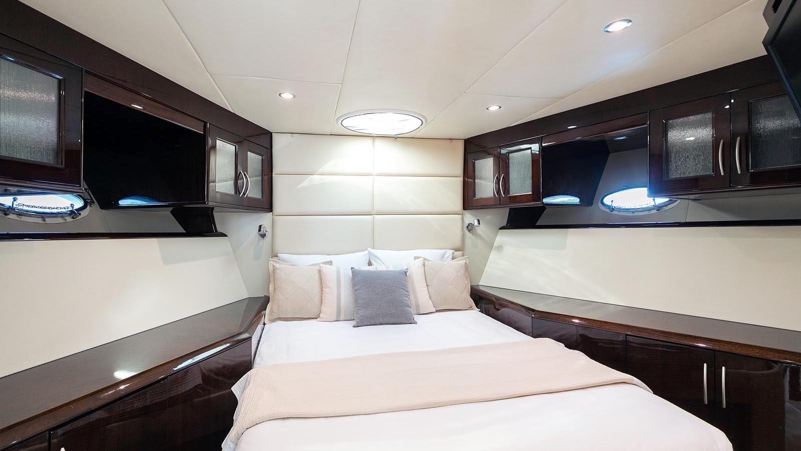 a room with a bed and a tv aboard 2008 LAZZARA LSX 75 Yacht for Sale