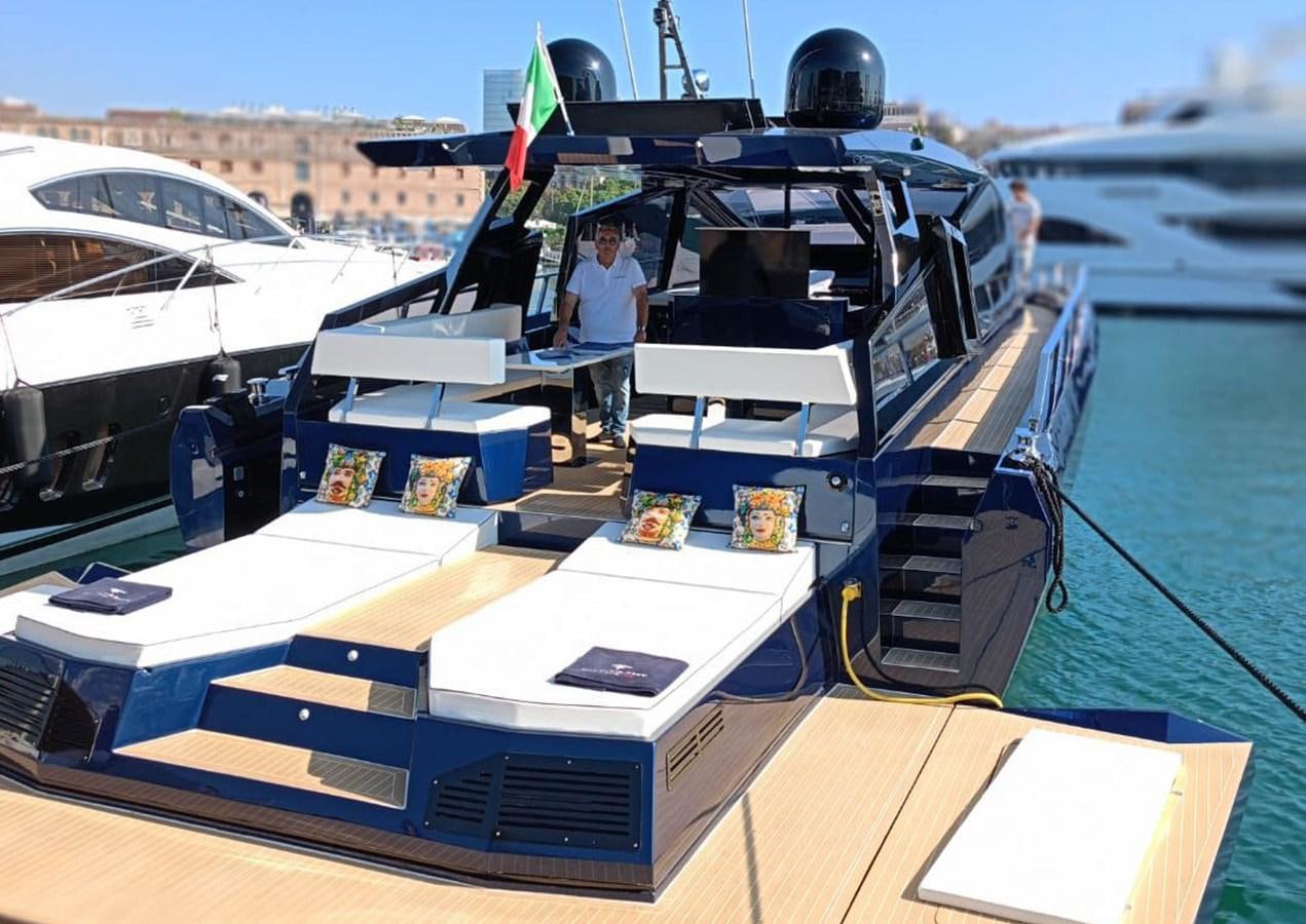 a person standing on a boat aboard SUERT 70 Yacht for Sale