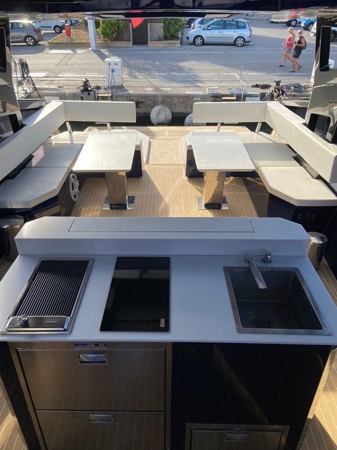 a collage of a building aboard SUERT 70 Yacht for Sale