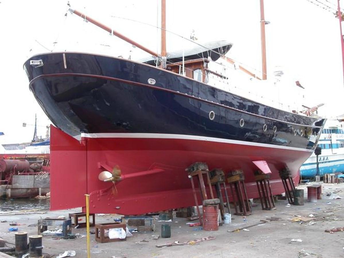 a boat on a dock aboard LIANA H Yacht for Sale