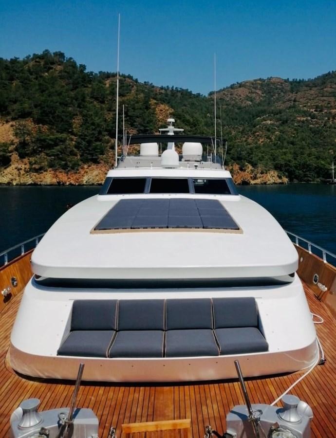 a boat on a deck aboard THIRTY LOVE Yacht for Sale