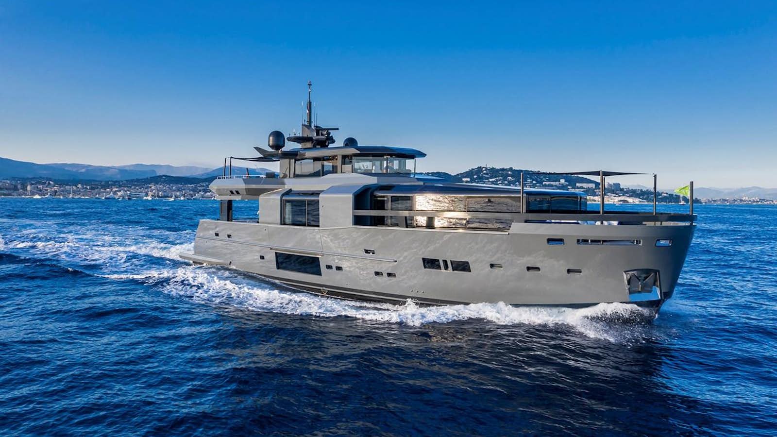 a large ship in the water aboard SEA CORAL II Yacht for Sale