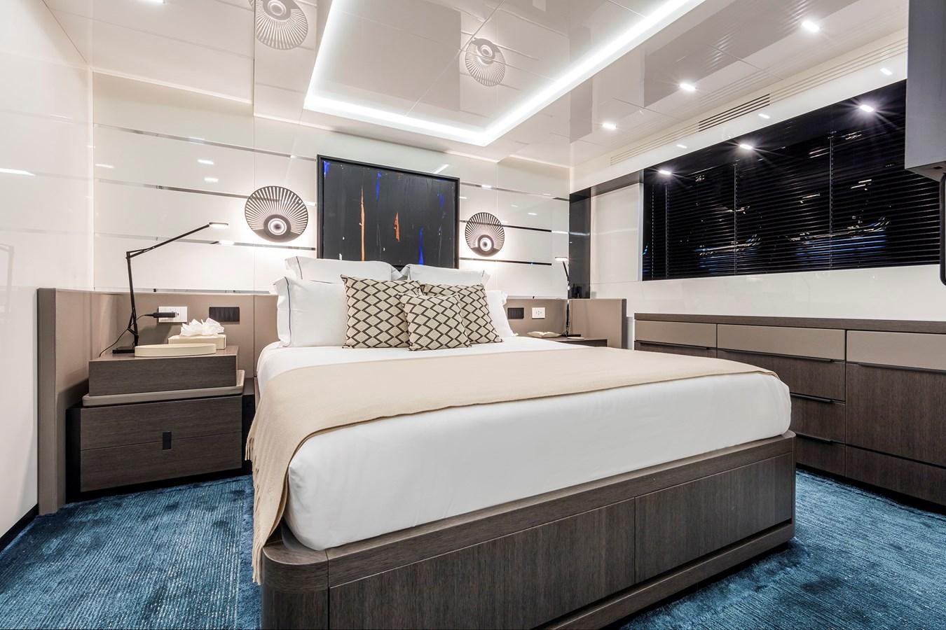 a bed in a room aboard SEA CORAL II Yacht for Sale