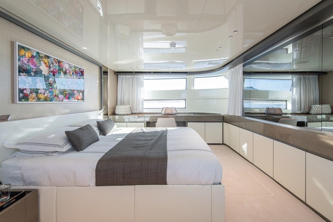 a bedroom with a large bed aboard STONE HILLS Yacht for Sale
