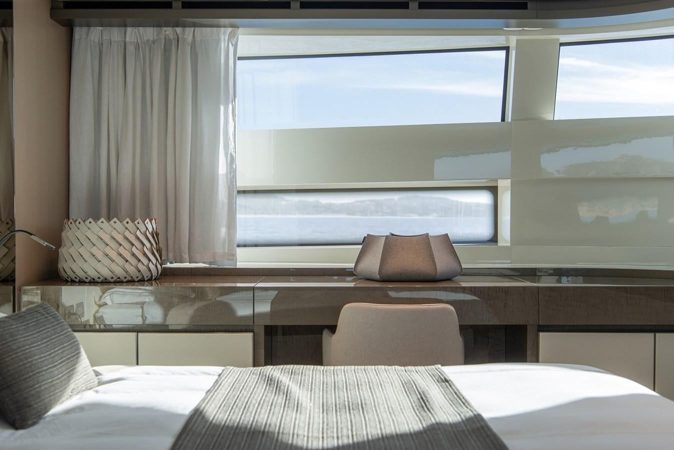 a room with a bed and a window aboard STONE HILLS Yacht for Sale