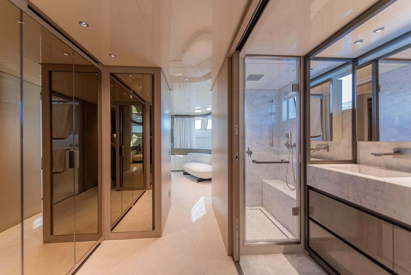 a room with glass doors aboard STONE HILLS Yacht for Sale