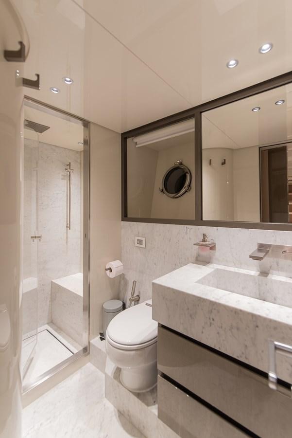 a bathroom with a glass shower aboard STONE HILLS Yacht for Sale