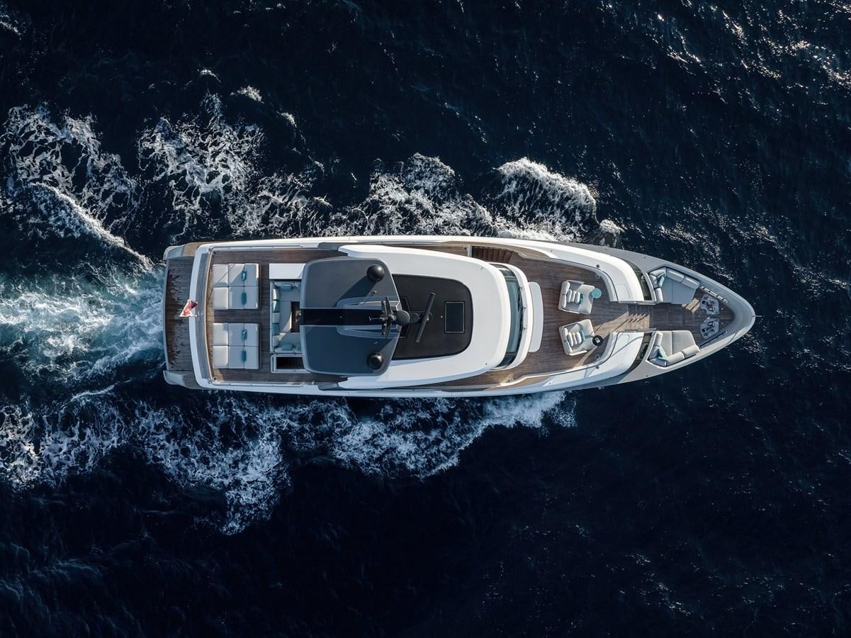a white car on a rocky surface aboard STONE HILLS Yacht for Sale
