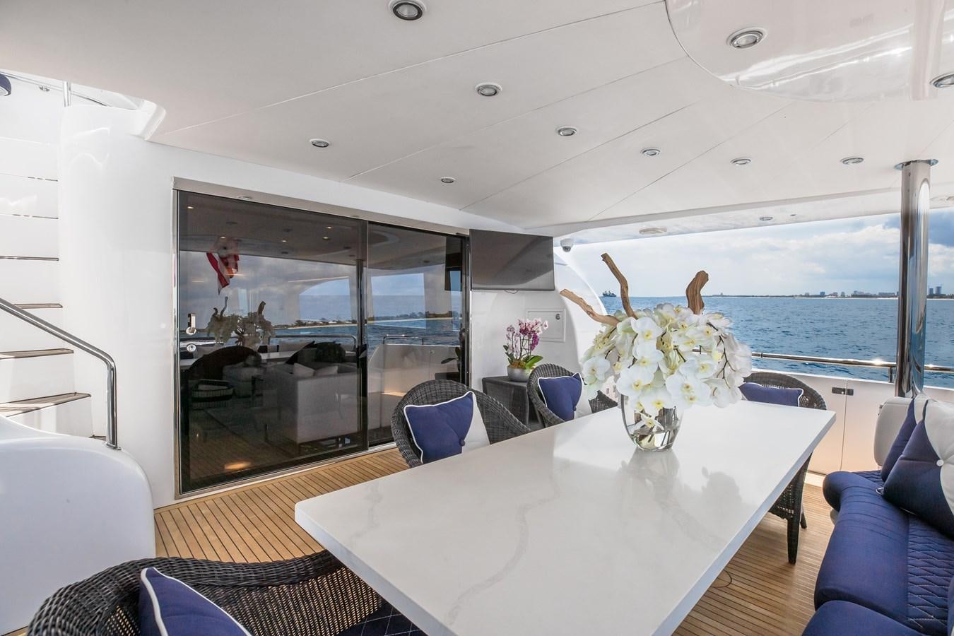 a dining room with a large body of water aboard BAD DADDY Yacht for Sale