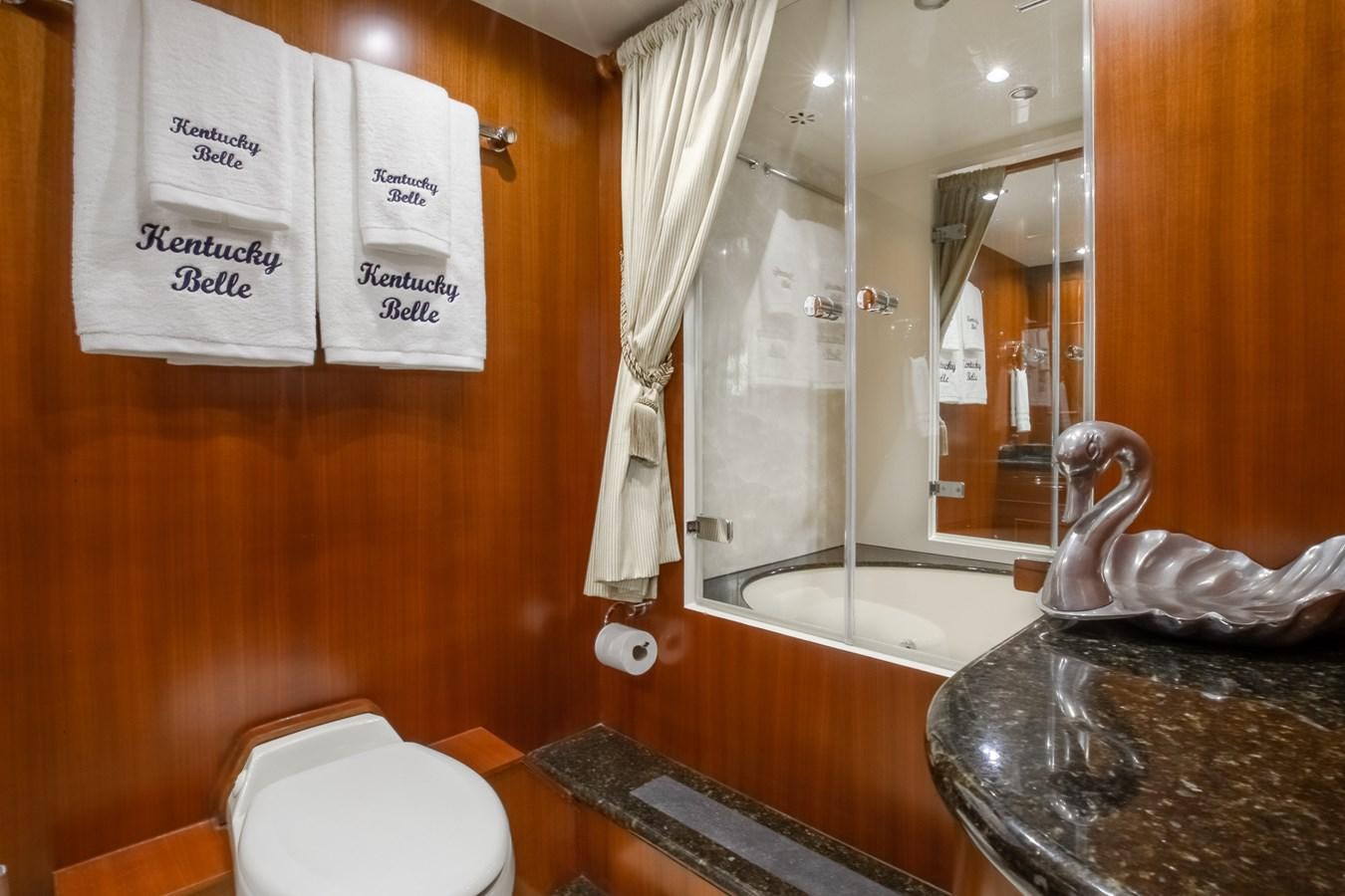 a bathroom with a glass counter aboard BAD DADDY Yacht for Sale