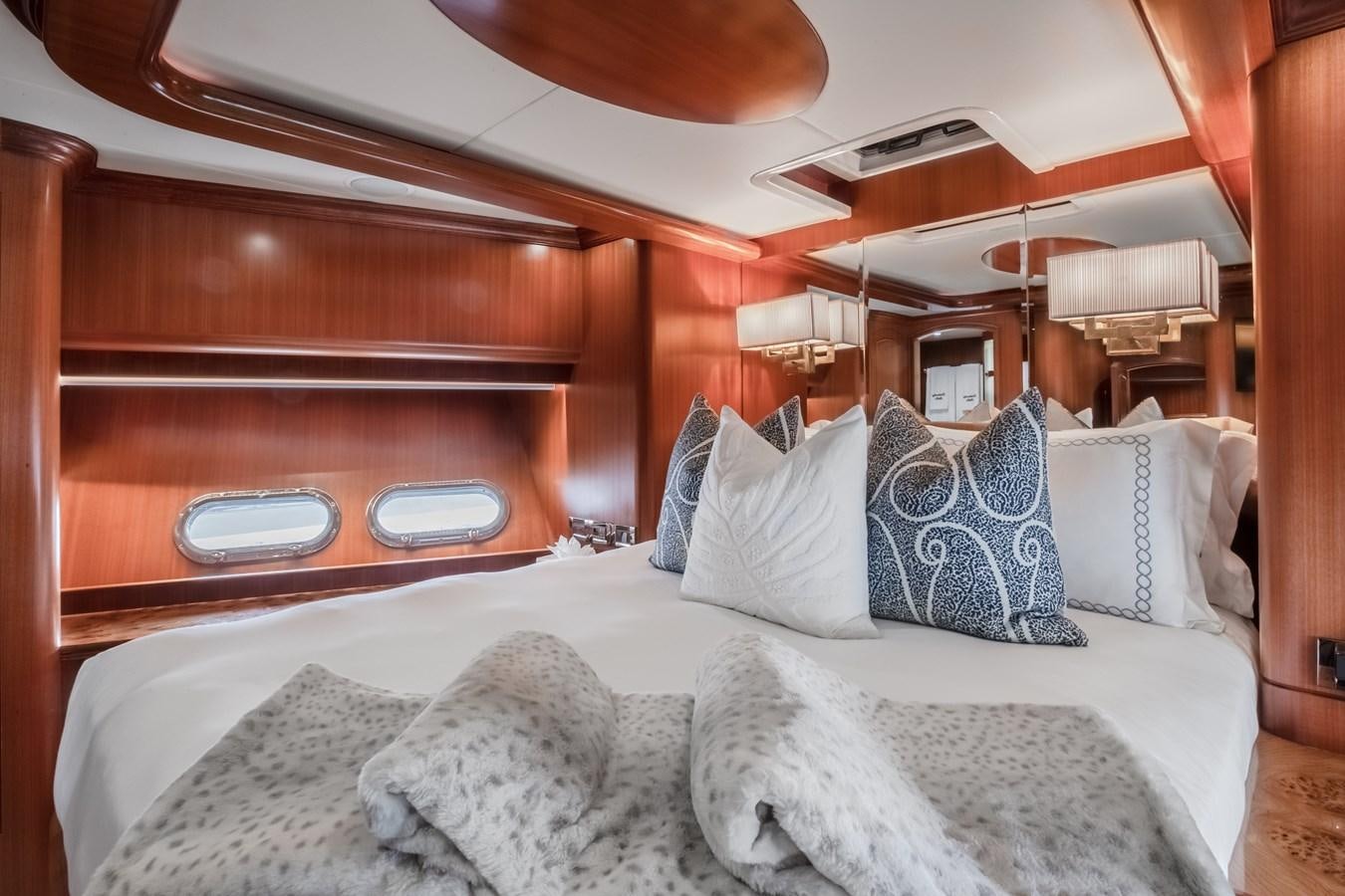 a bed with pillows aboard BAD DADDY Yacht for Sale