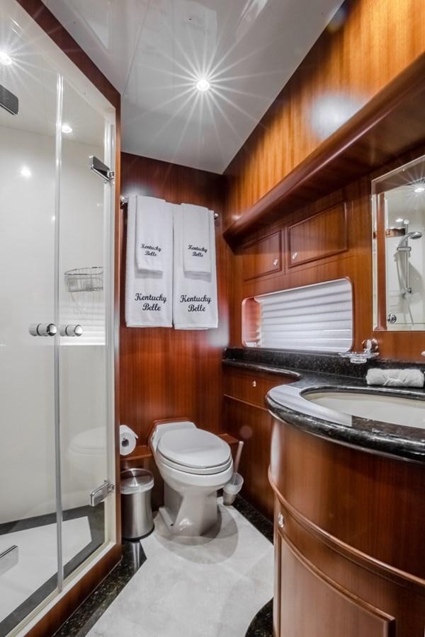 a bathroom with a shower and sink aboard BAD DADDY Yacht for Sale