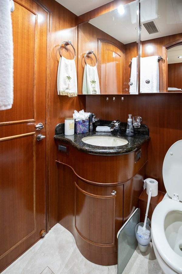 a bathroom with a sink and a toilet aboard BAD DADDY Yacht for Sale