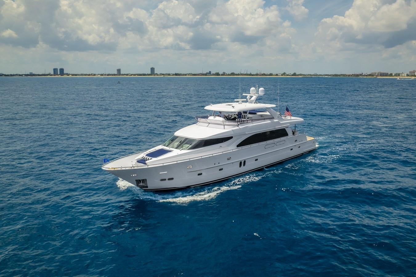a white yacht in the water aboard BAD DADDY Yacht for Sale