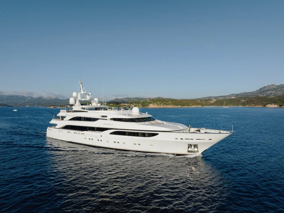 a white yacht in the water aboard LIONESS V Yacht for Sale