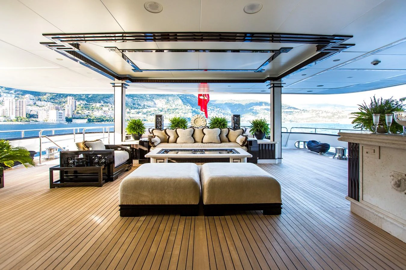 a large living room with a large deck and a large pool aboard LIONESS V Yacht for Sale