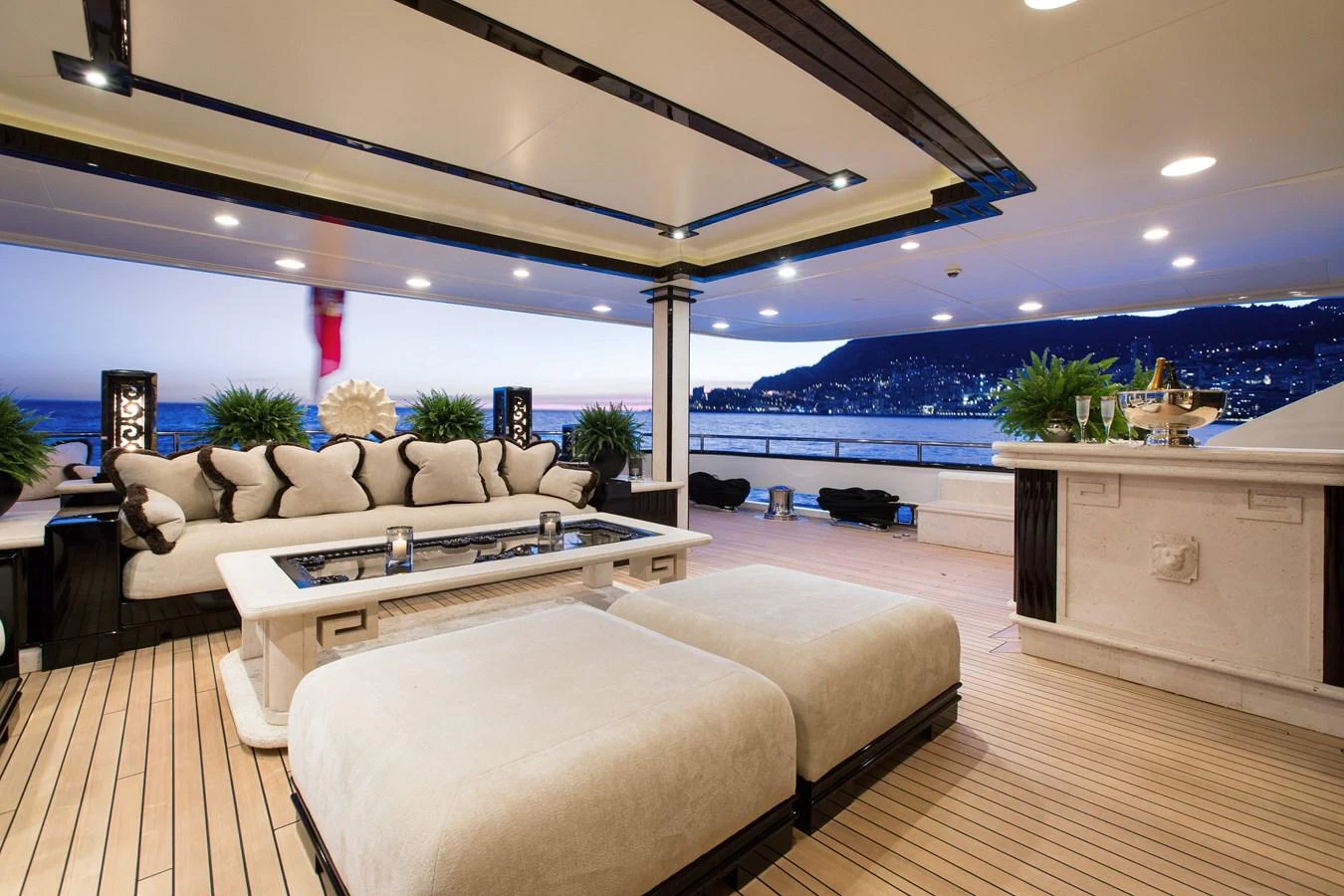 a living room with a large window aboard LIONESS V Yacht for Sale
