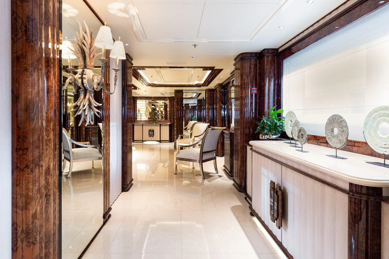 a large room with a large mirror and a counter aboard LIONESS V Yacht for Sale
