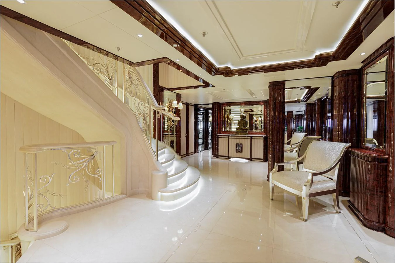a large room with a staircase and a staircase aboard LIONESS V Yacht for Sale