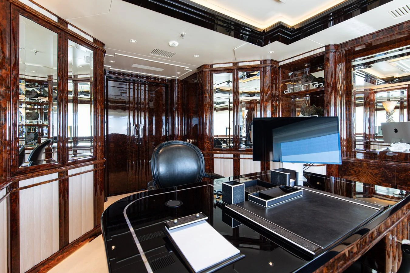 a room with a piano and a tv aboard LIONESS V Yacht for Sale