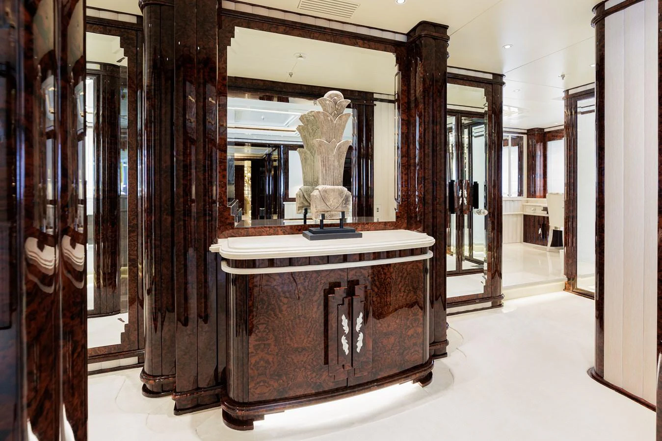 a large antique cabinet in a room aboard LIONESS V Yacht for Sale