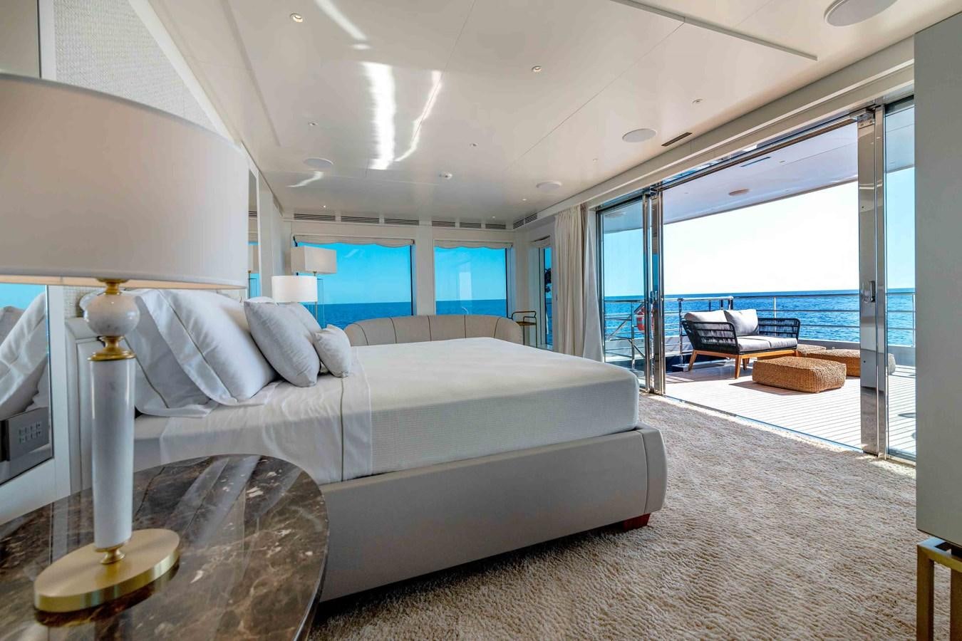a large bed in a room aboard MISS CANDY Yacht for Sale
