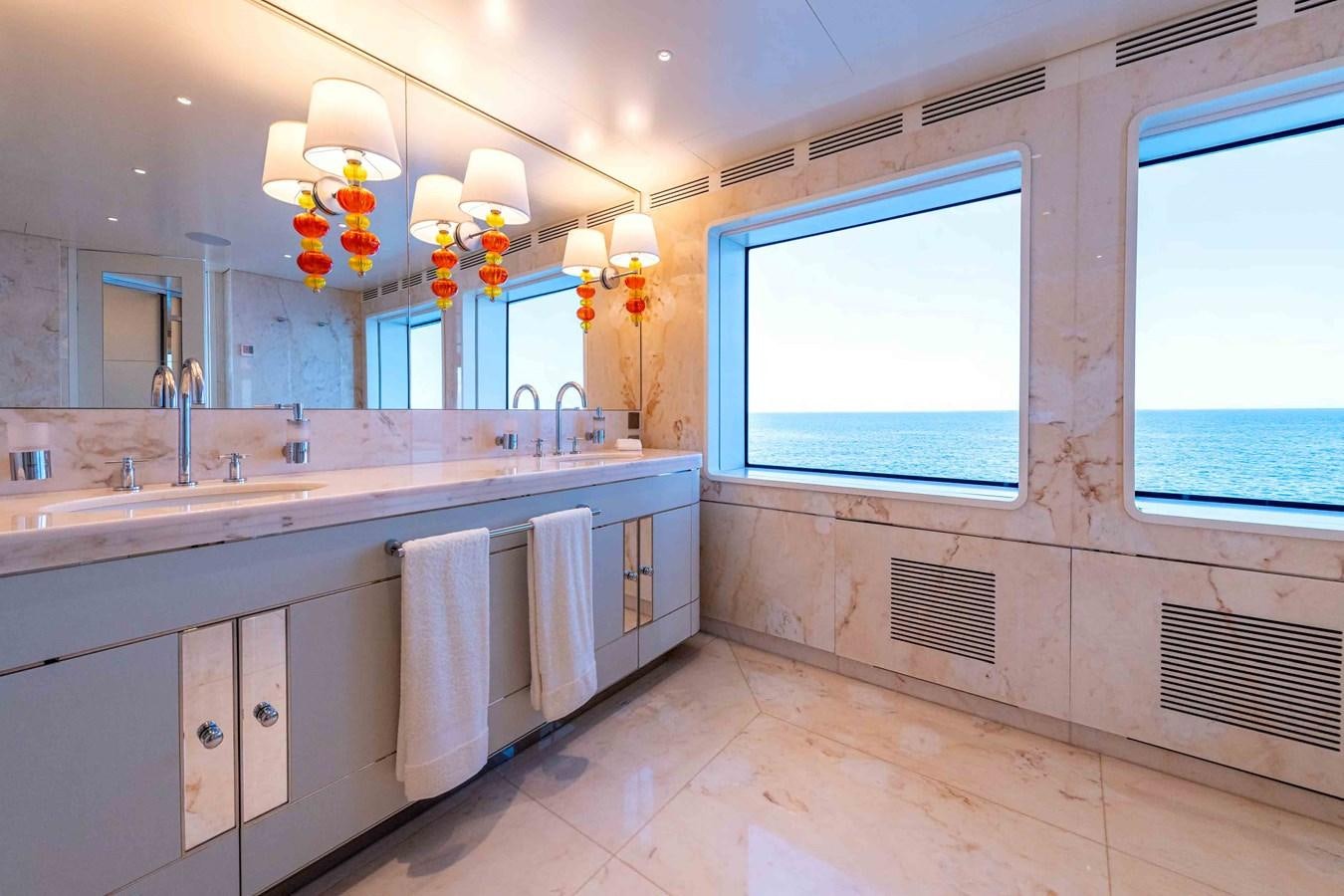 a bathroom with a large window aboard MISS CANDY Yacht for Sale