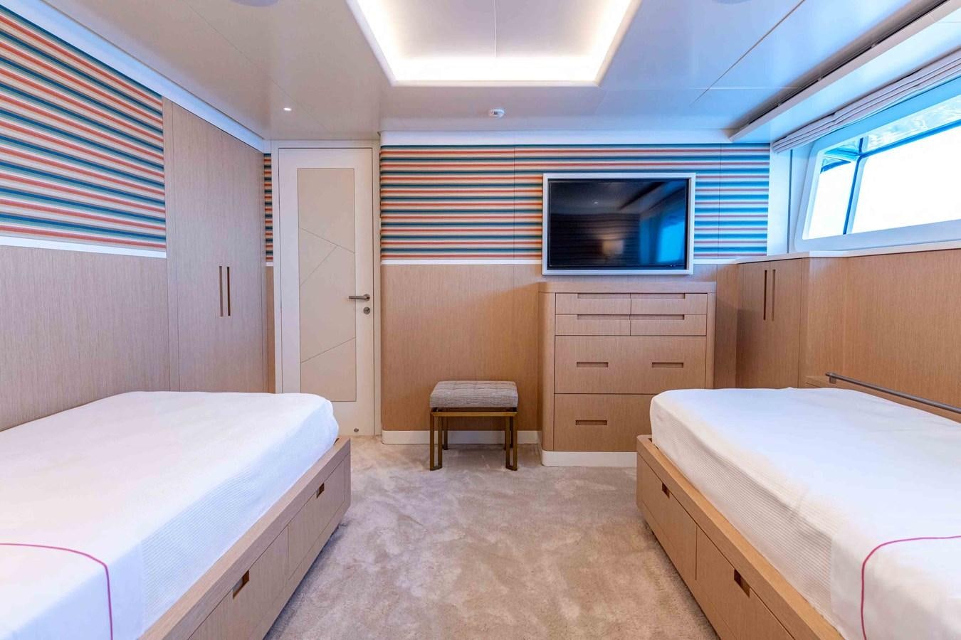 a room with two beds aboard MISS CANDY Yacht for Sale