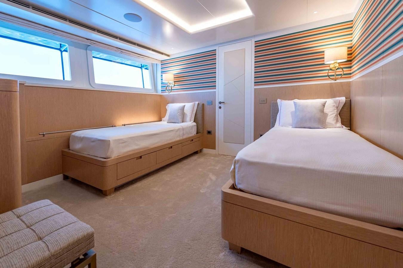 a room with two beds aboard MISS CANDY Yacht for Sale
