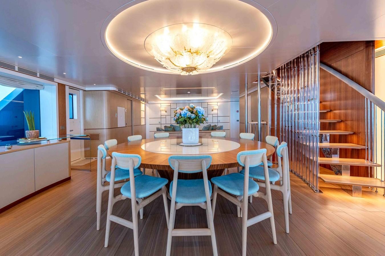 a dining room with a table and chairs aboard MISS CANDY Yacht for Sale