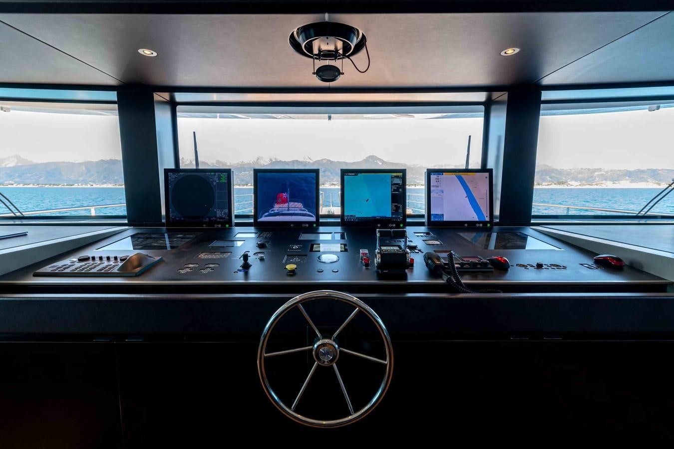 a control panel with many monitors aboard MISS CANDY Yacht for Sale