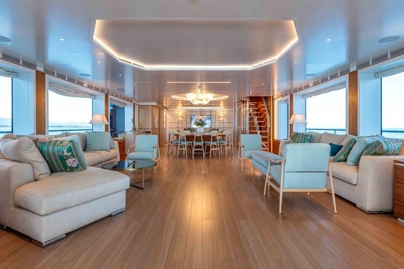 a living room with a wood floor aboard MISS CANDY Yacht for Sale