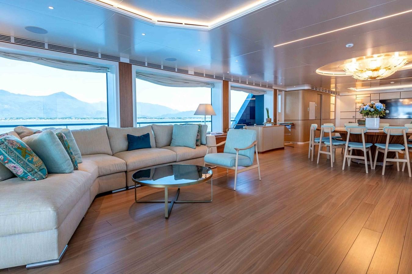 a living room with a wood floor aboard MISS CANDY Yacht for Sale