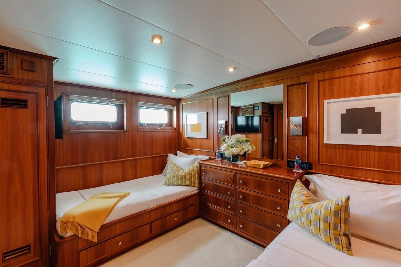 a room with a bed and a television aboard CALYPSO Yacht for Sale