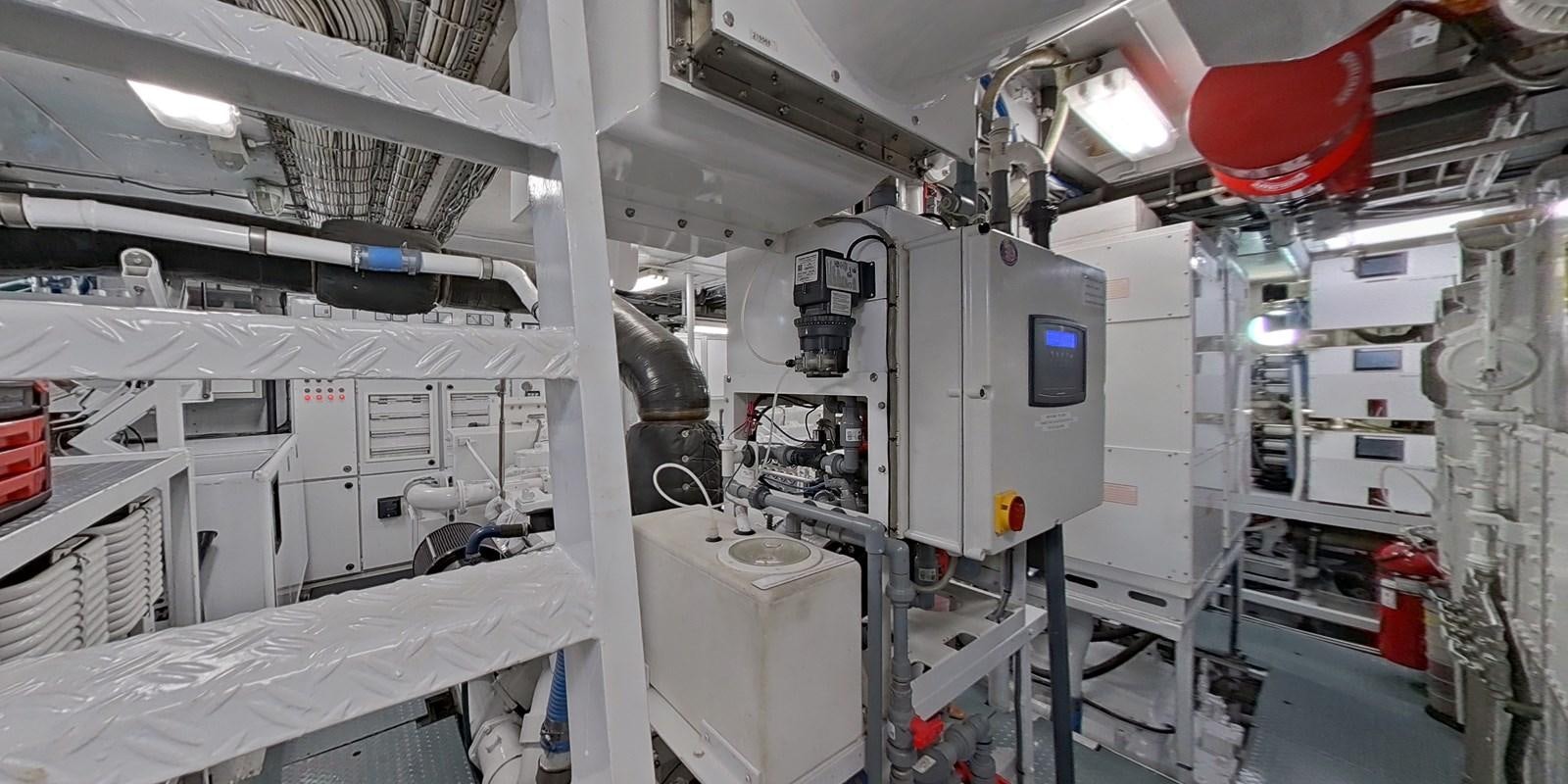 a large white machine in a factory aboard CALYPSO Yacht for Sale