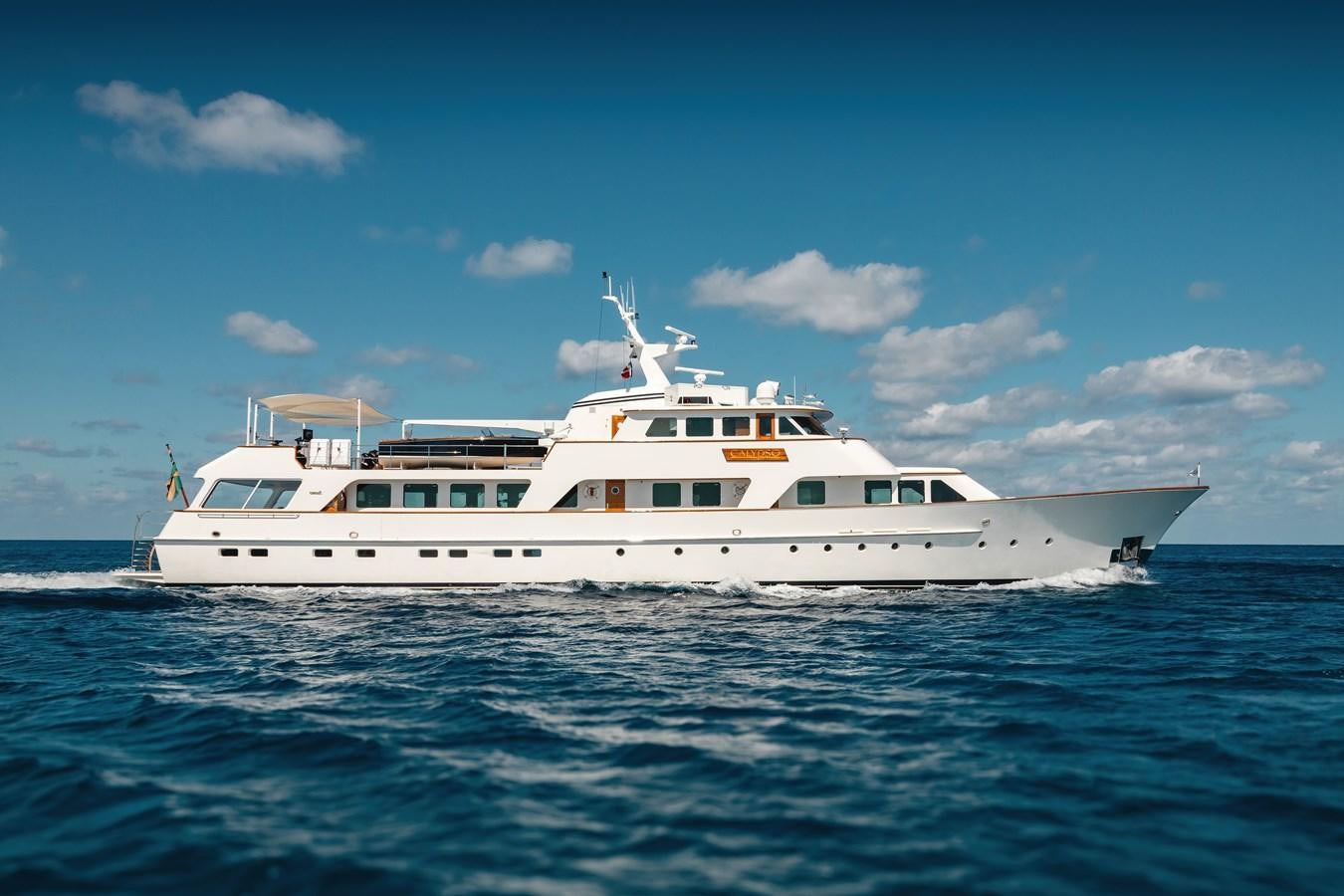 a white yacht in the water aboard CALYPSO Yacht for Sale