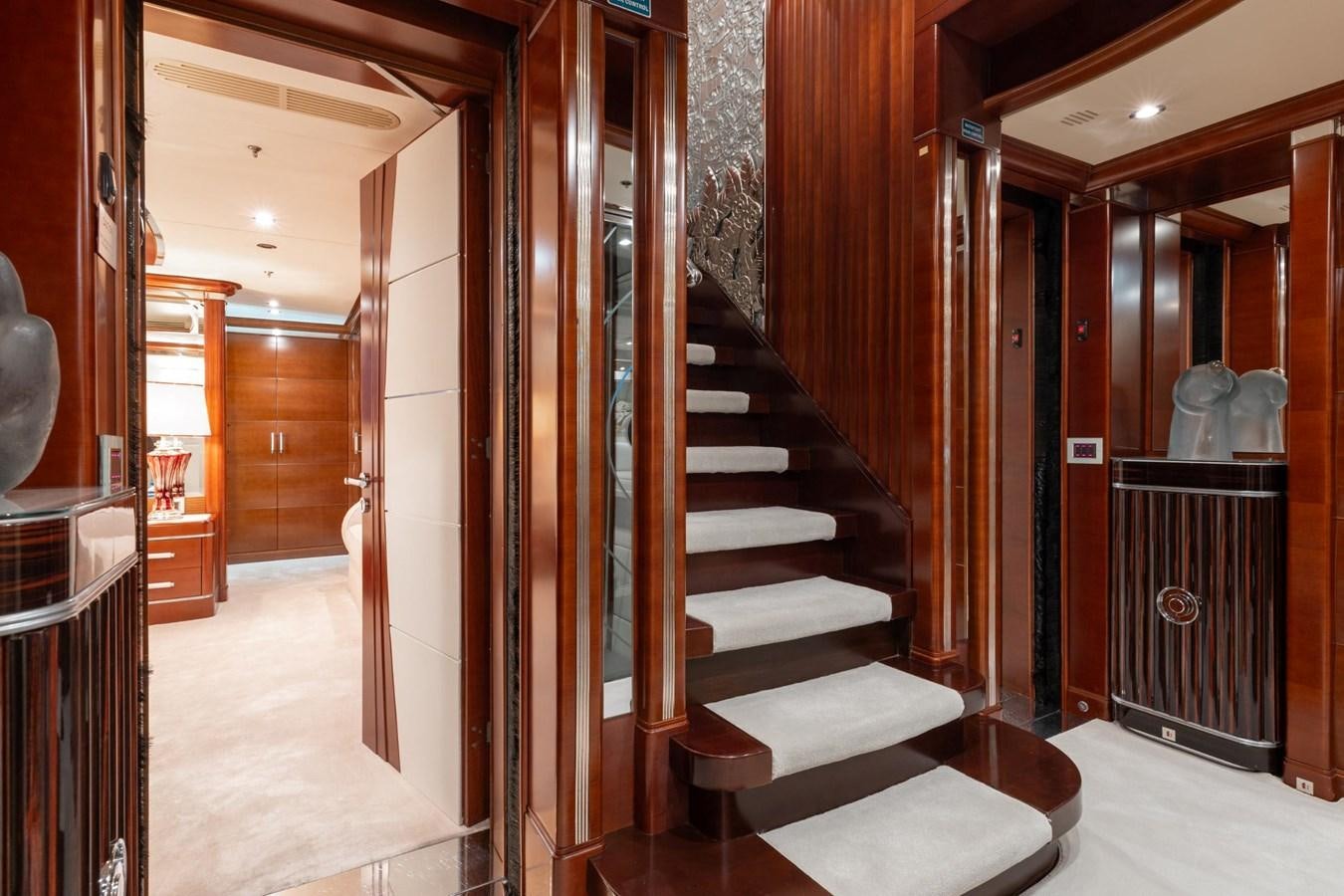 a hallway with wood doors aboard LADY B Yacht for Sale