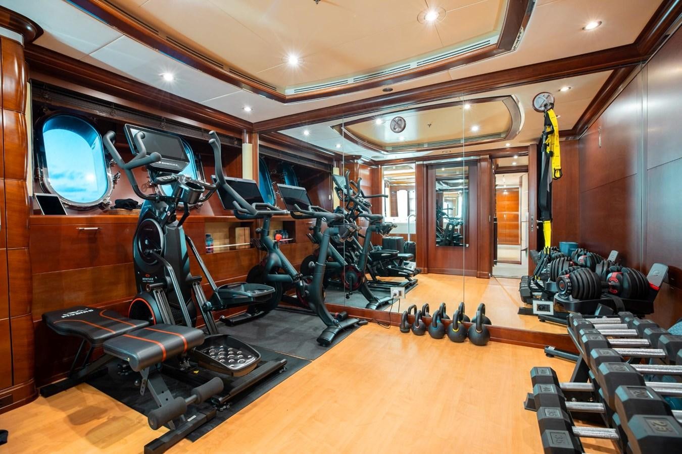a gym with exercise equipment aboard LADY B Yacht for Sale
