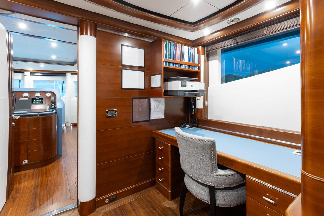 a room with a desk and a chair aboard LADY B Yacht for Sale