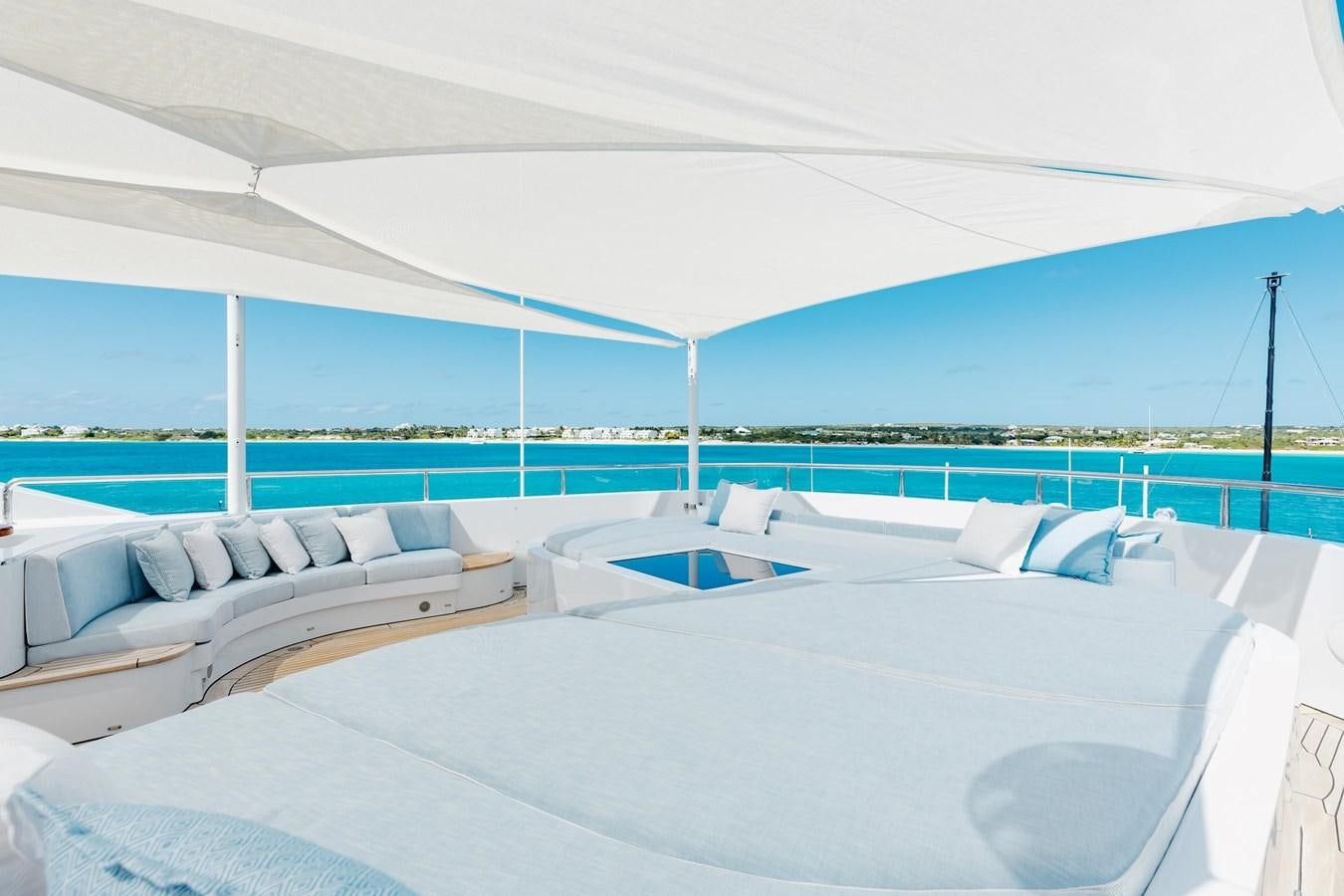 a room with a bed and a pool aboard LADY B Yacht for Sale