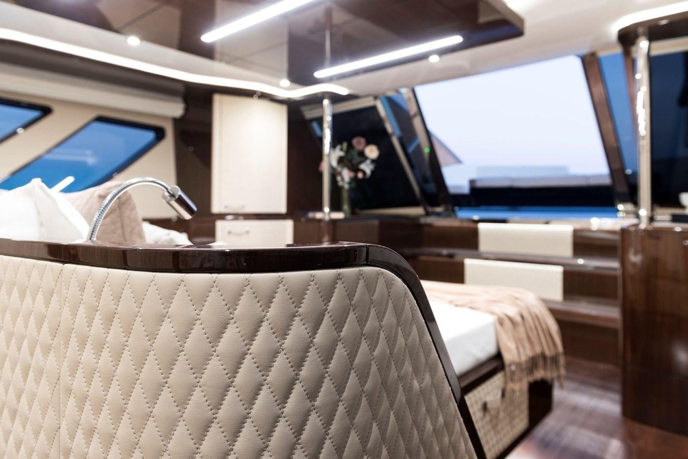 a room with a desk and a computer aboard 2024 LAZZARA LSX 67 Yacht for Sale
